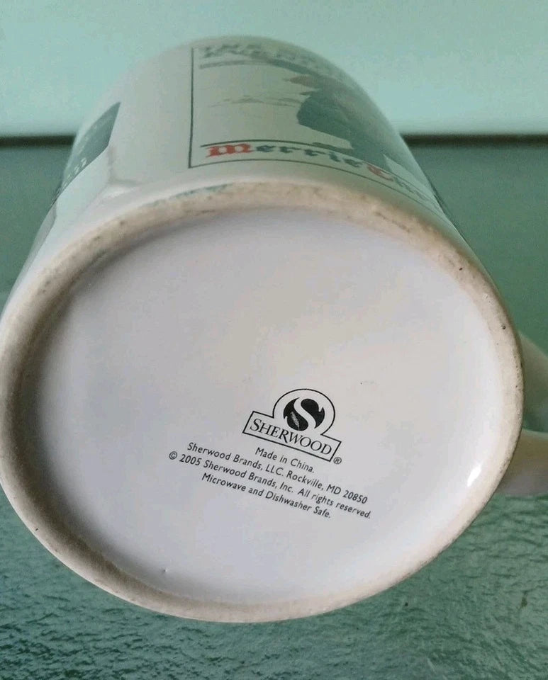 Mug with Sherwood branding on a green background