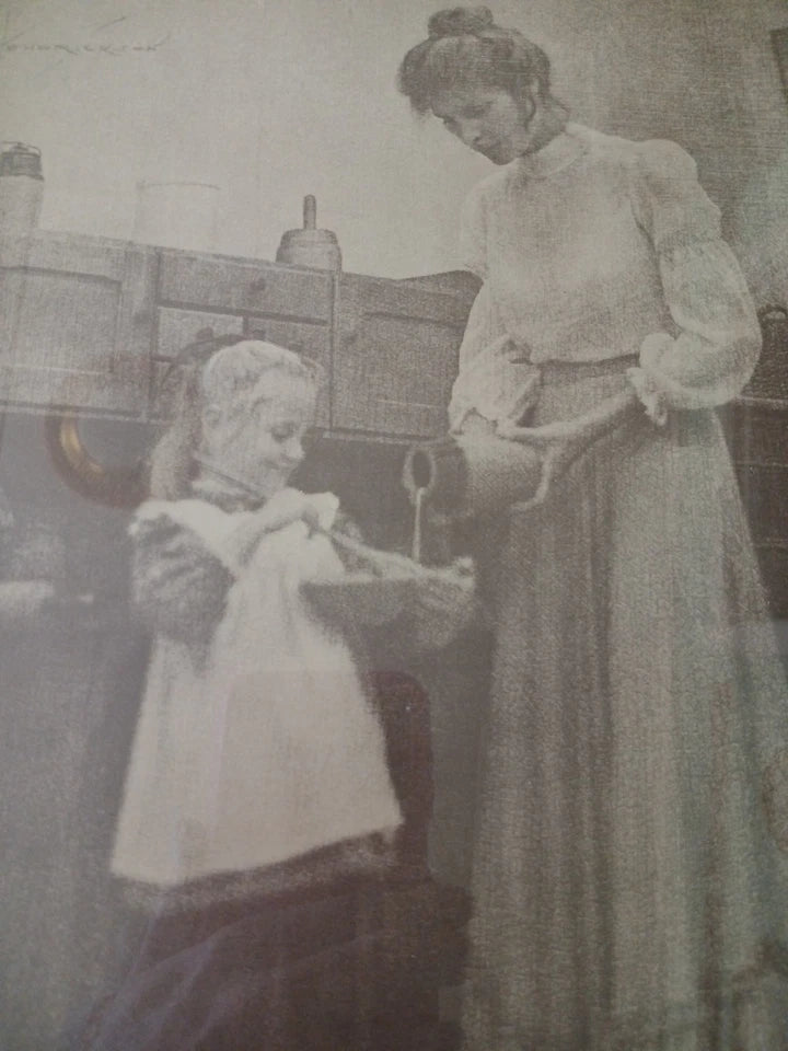 Two women in vintage attire standing near a wooden cabinet.