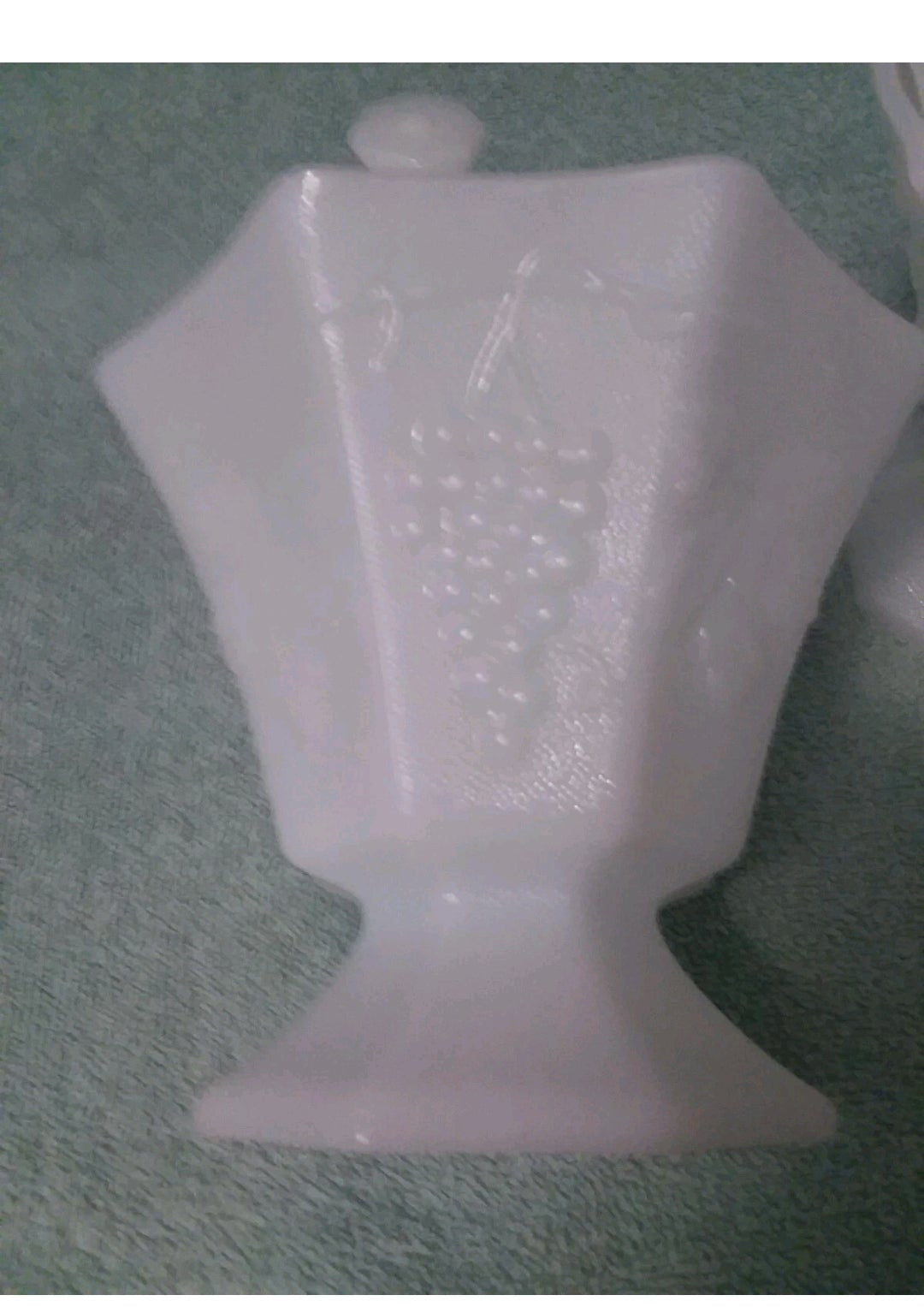 white fruit candy dish  with grapes on it 