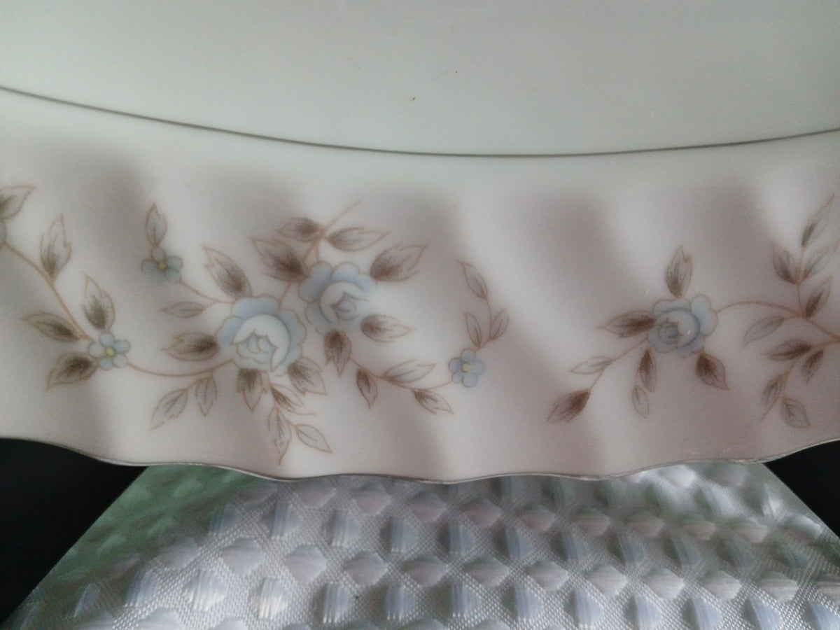 Floral-patterned fabric with a white background