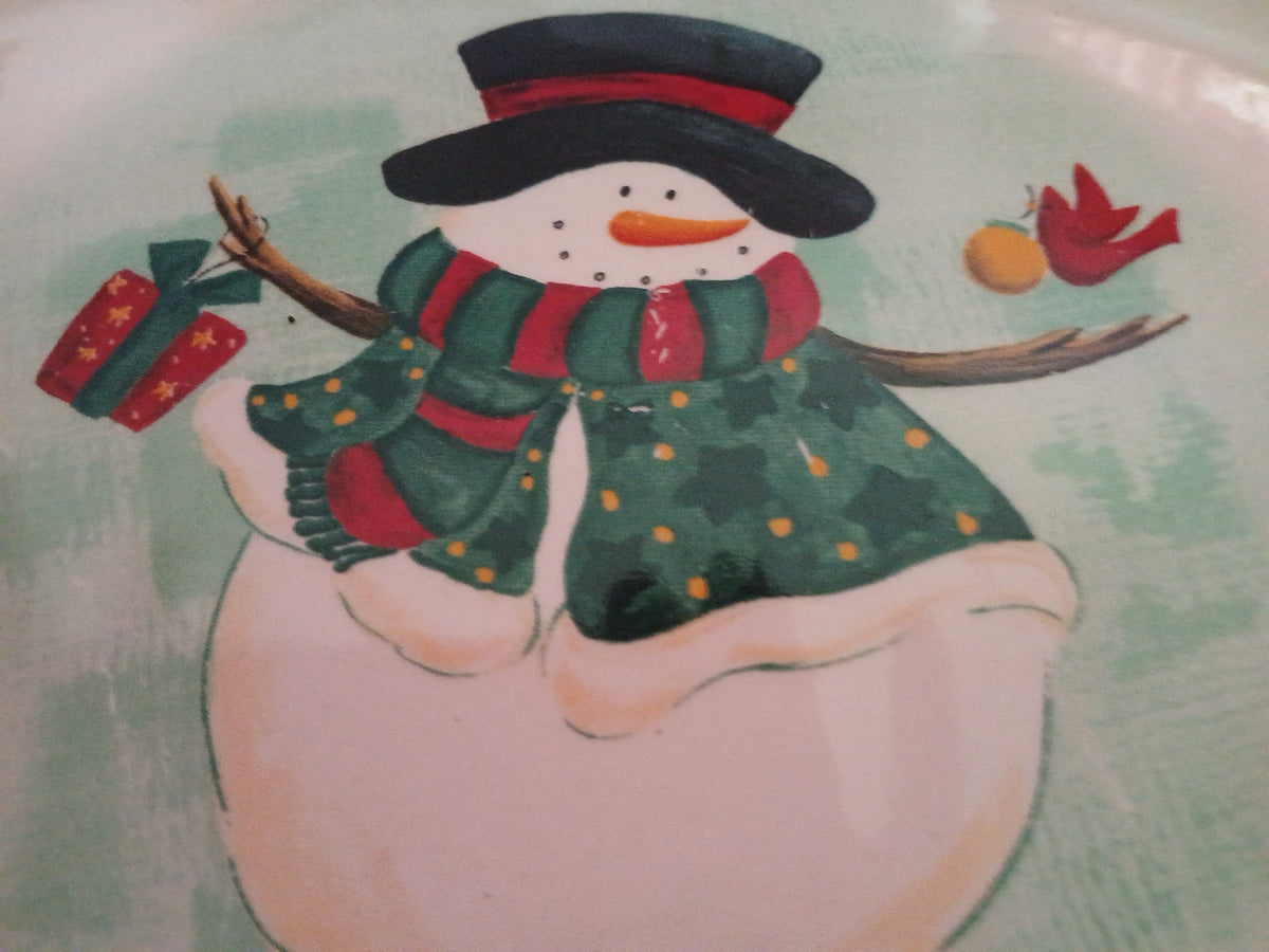 Illustration of a snowman with a green and red striped hat on a textured background