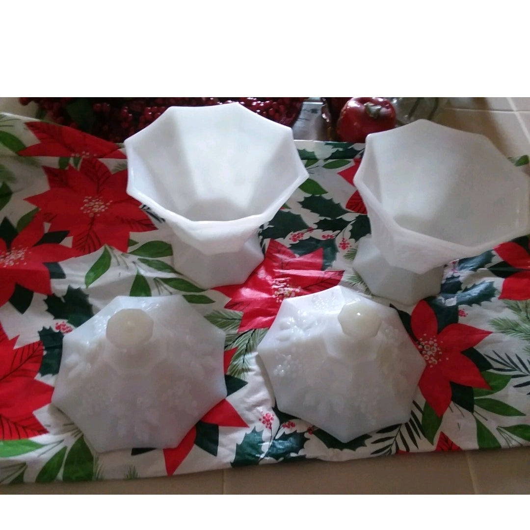 two white candy dishes with lids on a red flowered background 