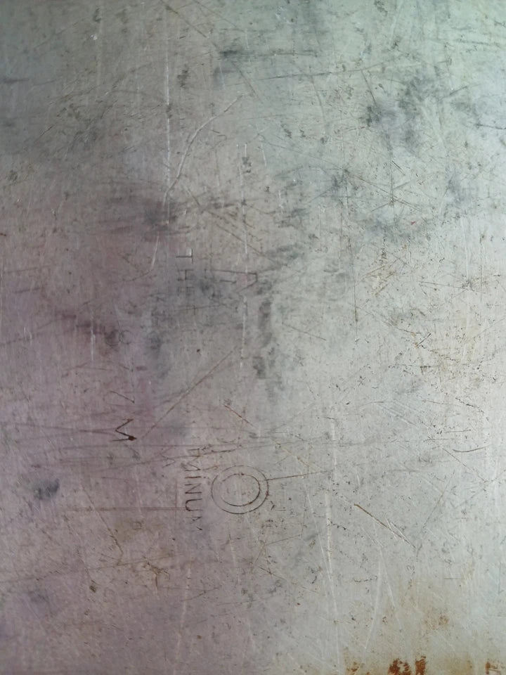 Scratched surface with visible wear and tear