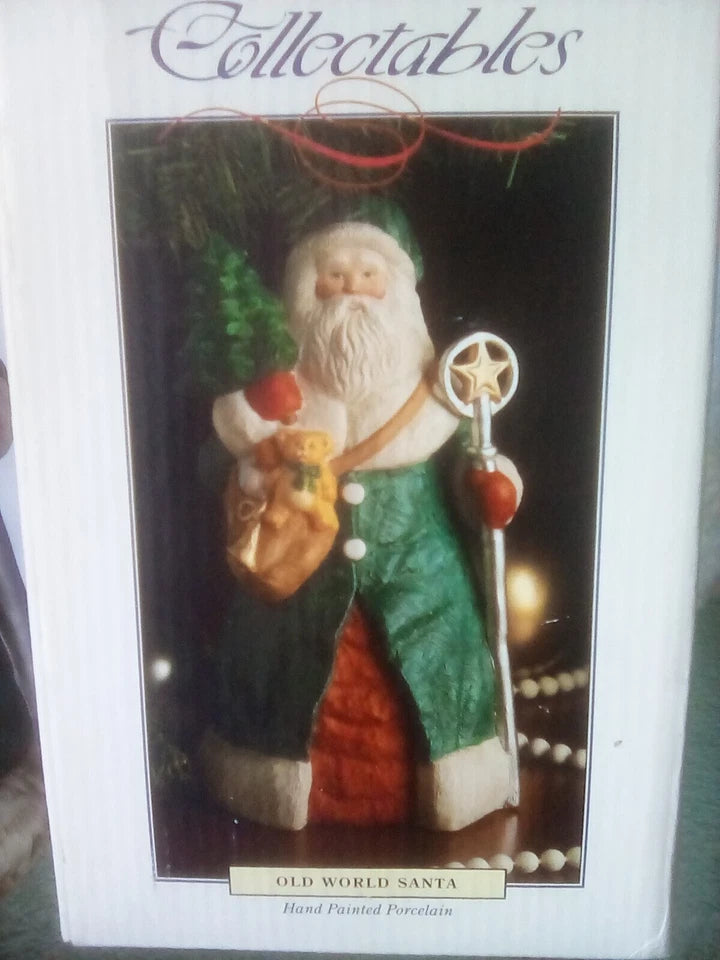 Decorative figurine of a Santa Claus in packaging with 'Collectables' text.