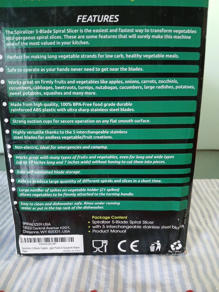 Back of a spiralizer packaging with features listed on a striped fabric background