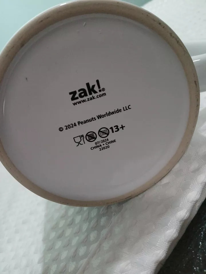 Close-up of a product with 'zak!' branding on a light background
